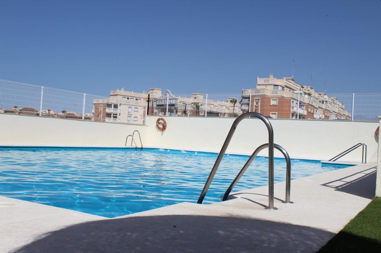 SOL Y PLAYA ROQUETAS-Ático con piscina, solarium y garaje ...