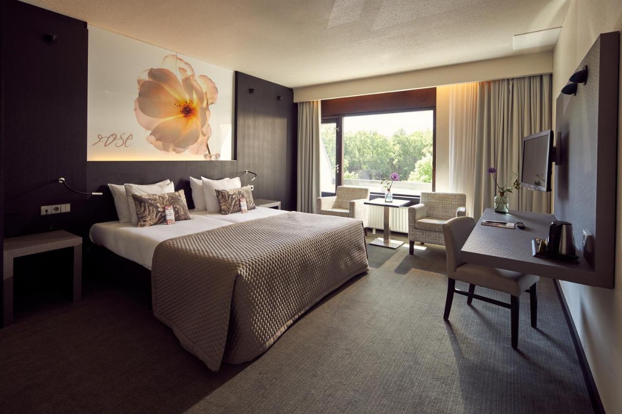 Un ou plusieurs lits dans un hébergement de l'établissement Van der Valk Hotel Arnhem