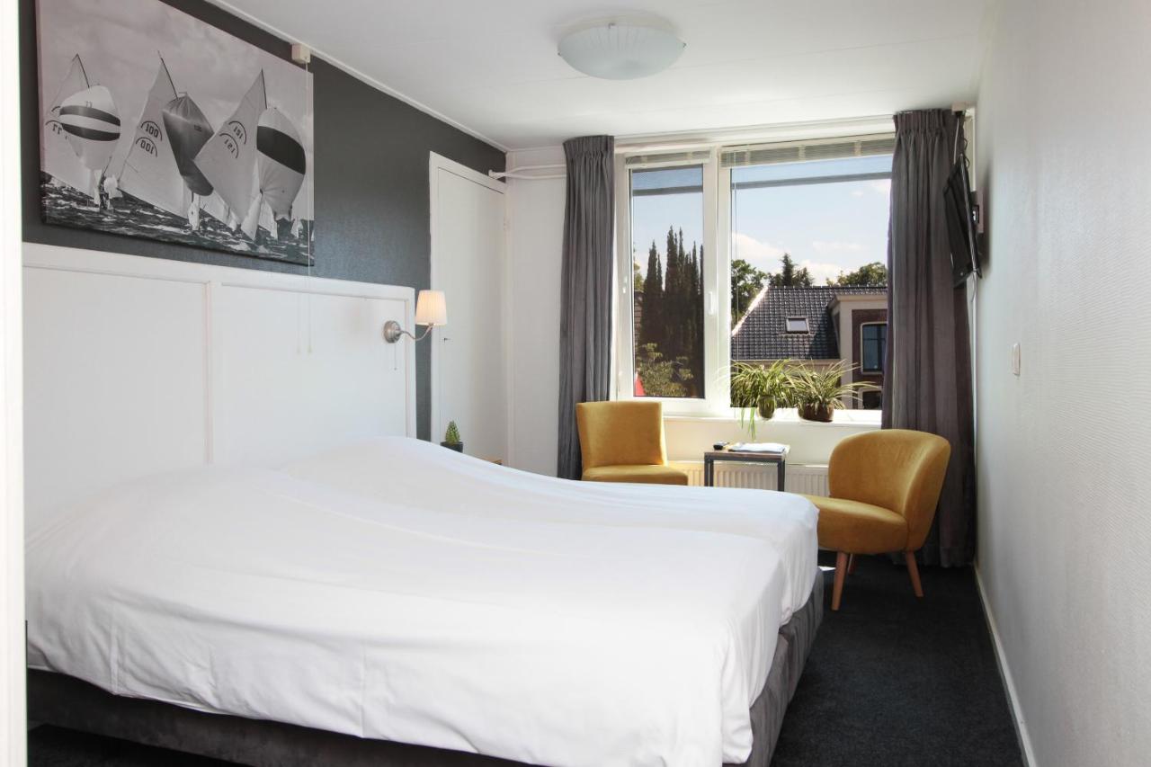 Een bed of bedden in een kamer bij Hotel Restaurant Goerres
