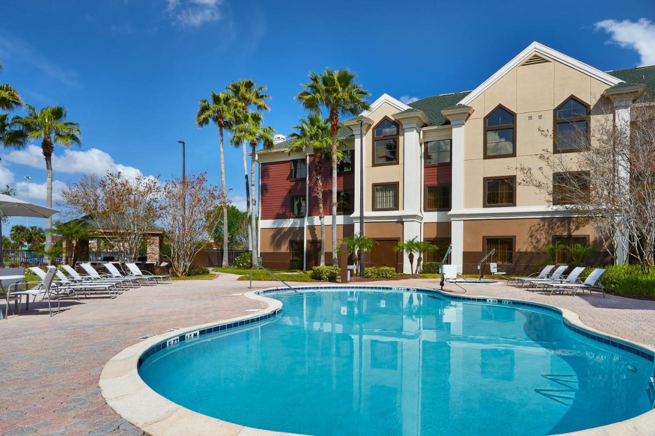Heated swimming pool: Staybridge Suites Orlando South, an IHG Hotel