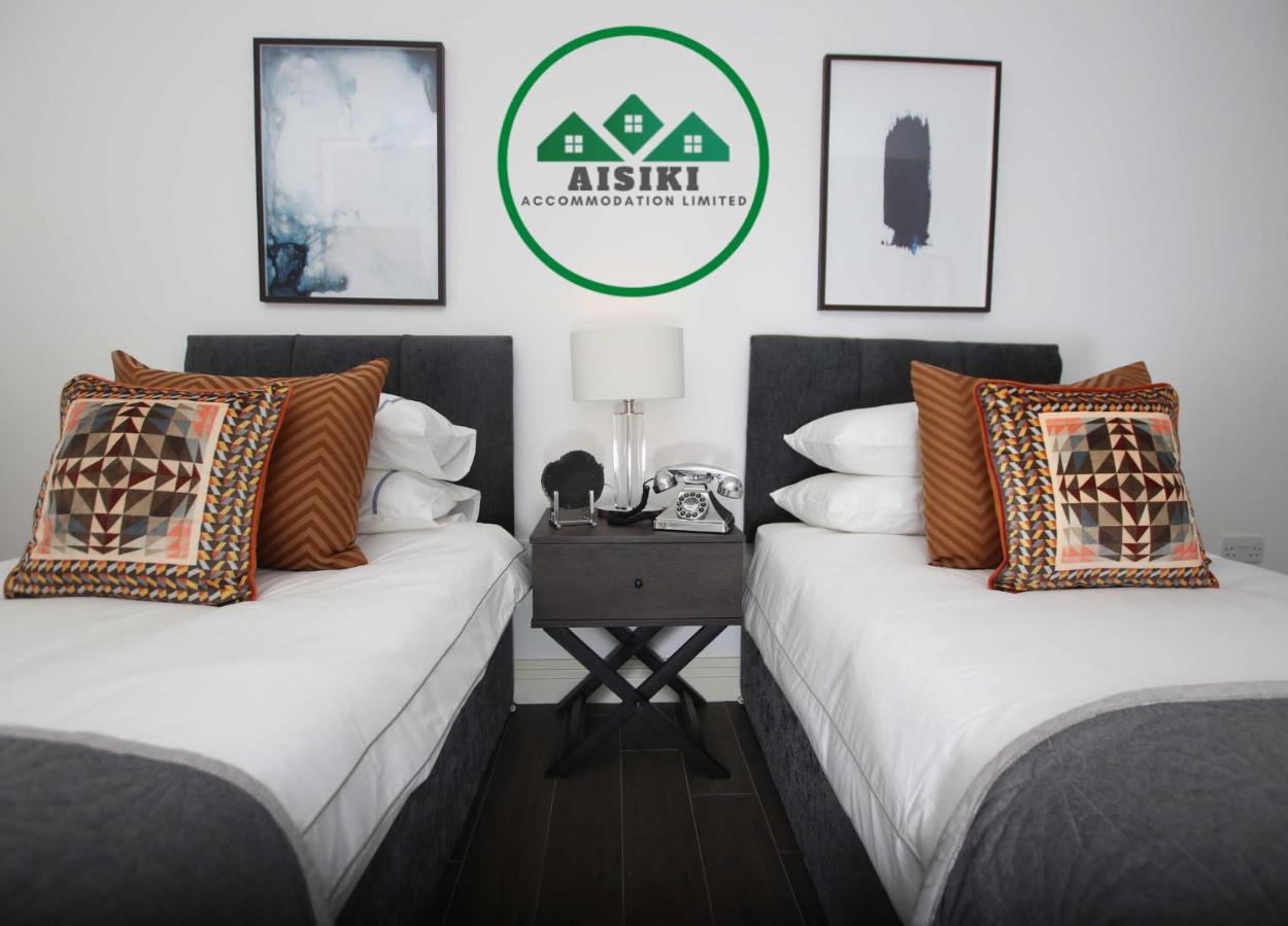 Aisiki Living at Upton Rd, Multiple 1, 2, or 3 Bedroom Apartments, King or Twin beds with FREE WIFI and FREE PARKING photo