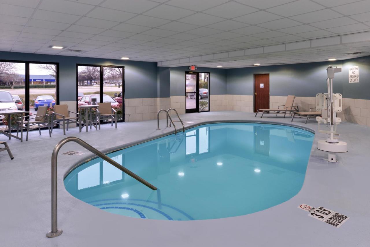 Heated swimming pool: Holiday Inn Express & Suites Raleigh NE - Medical Ctr Area, an IHG Hotel