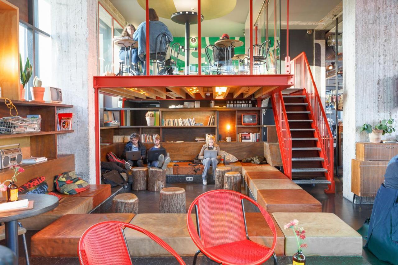 a group of people sitting in a room at Volkshotel in Amsterdam