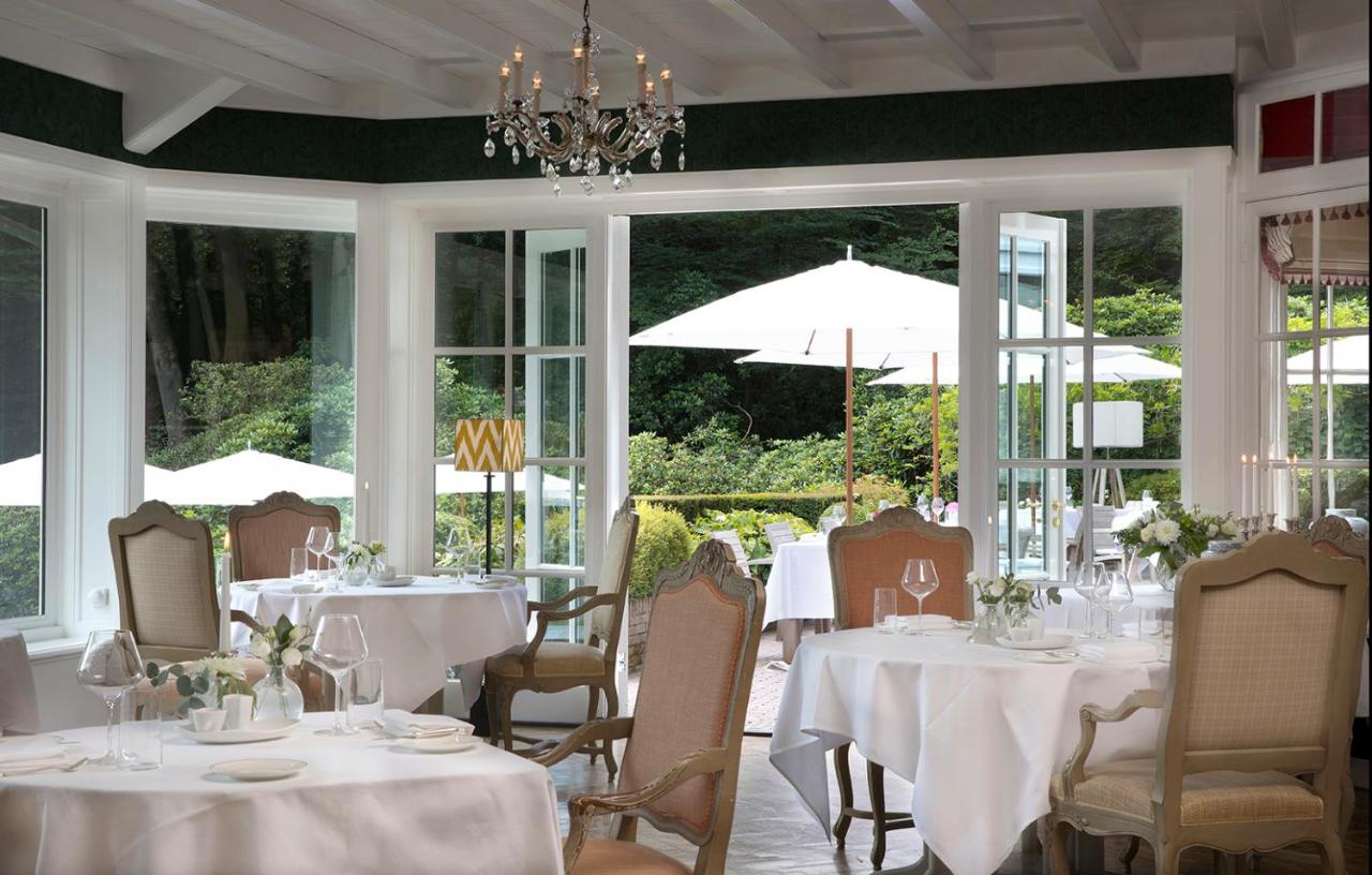 Een restaurant of ander eetgelegenheid bij Relais & Chateaux Hotel Landgoed Het Roode Koper