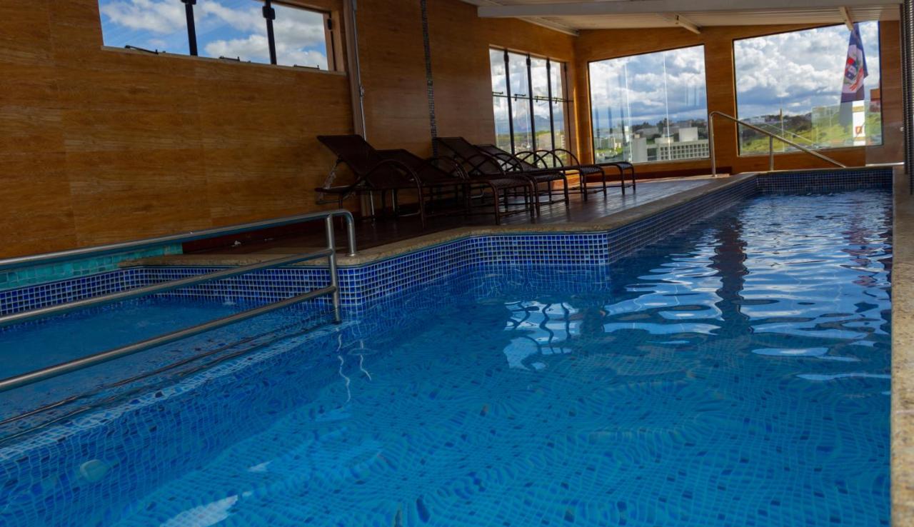 Rooftop swimming pool: Granlago Hotel