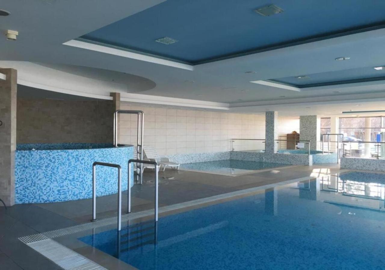 Heated swimming pool: MF Club 218 Golden Beach Wellness Apartment