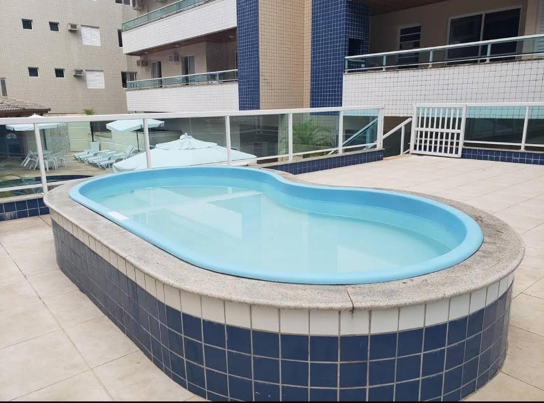 Heated swimming pool: Apto Praia Grande Ubatuba area nobre com toda comodidade para você e sua família !