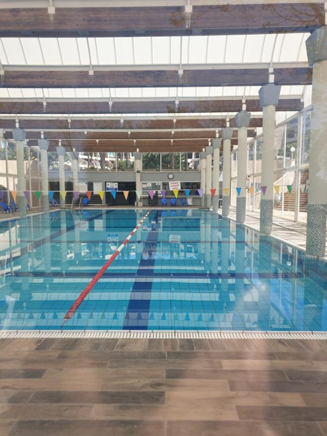 Heated swimming pool: Suite Nof Caesar