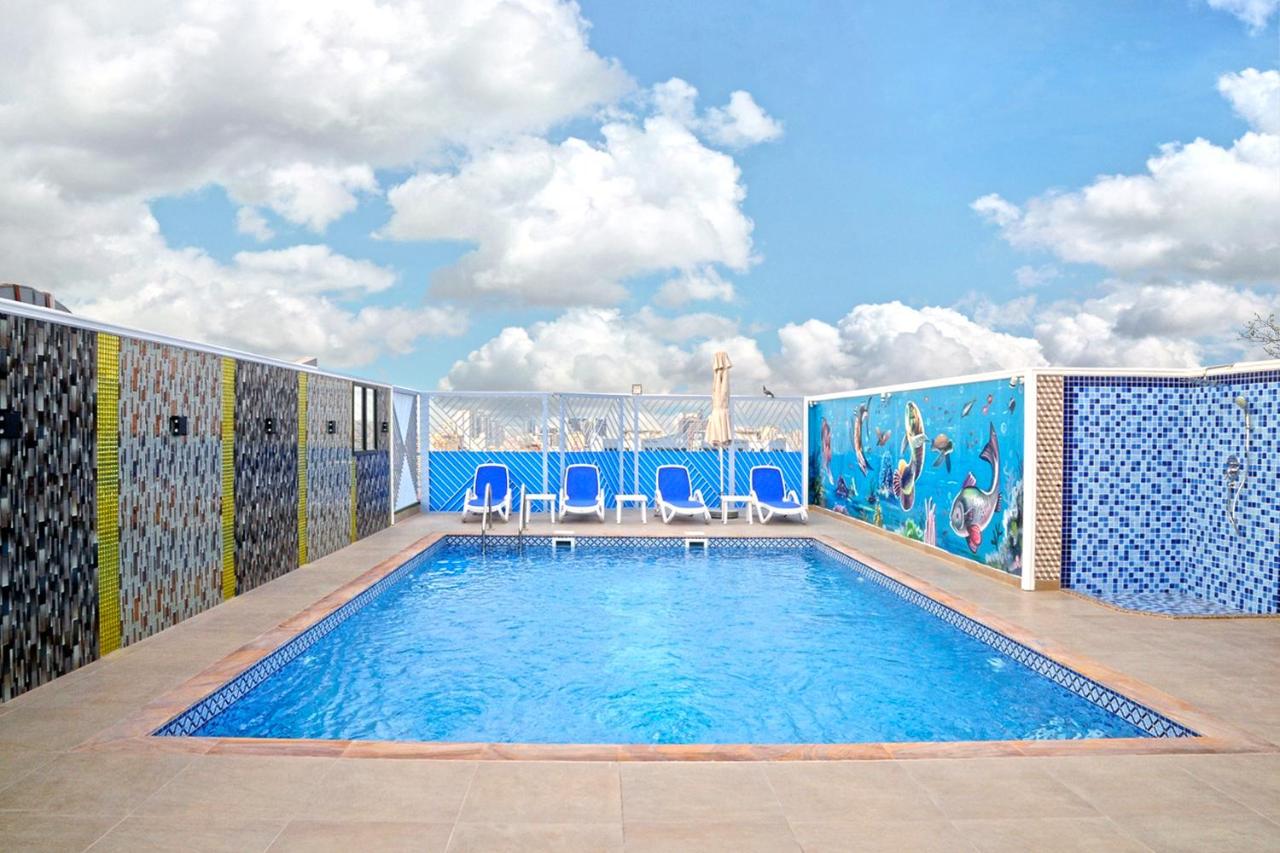 Heated swimming pool: Alain Hotel Ajman