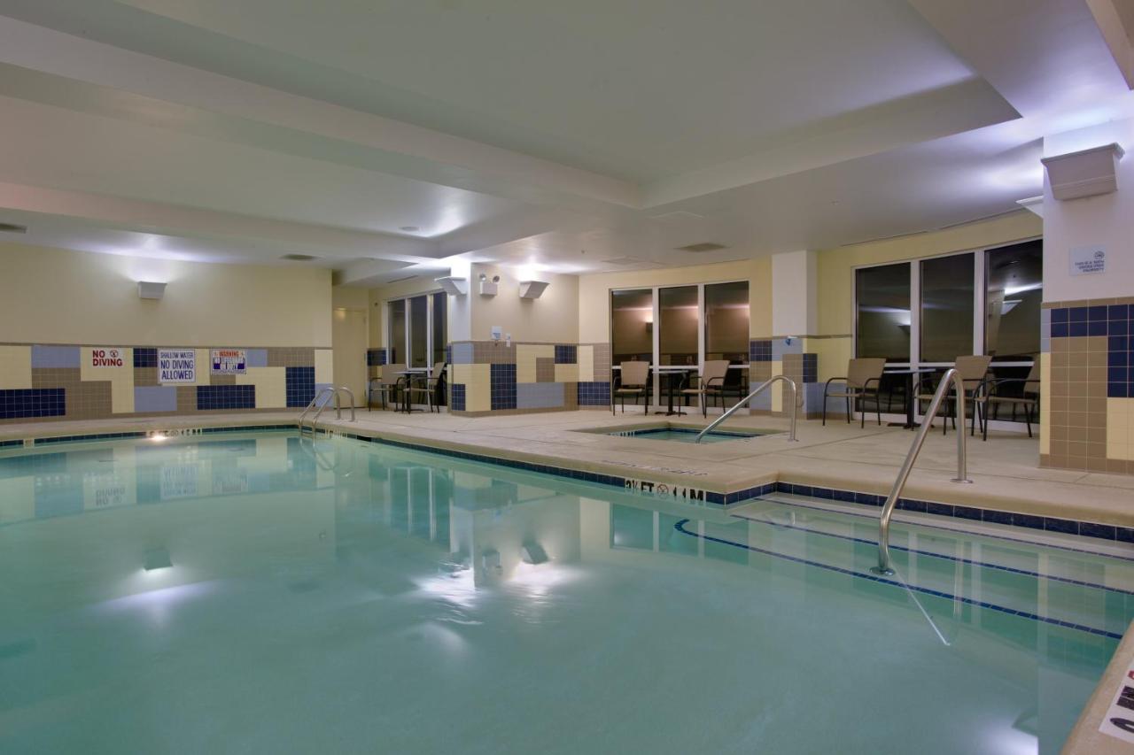 Heated swimming pool: Holiday Inn Express Hotel Raleigh Southwest, an IHG Hotel