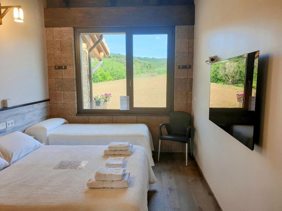 Cama o camas de una habitación en Casa Nahia Hostal Rural