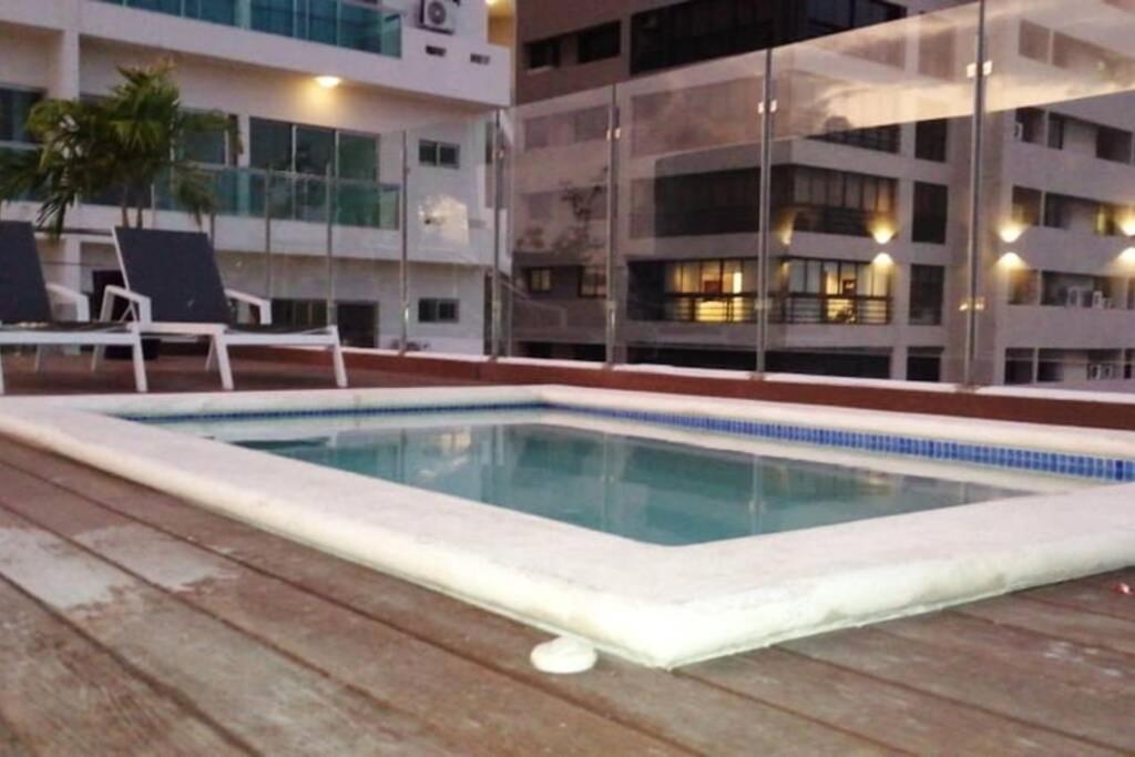 Rooftop swimming pool: Brand New Apartment with Pool and Gym in La Julia