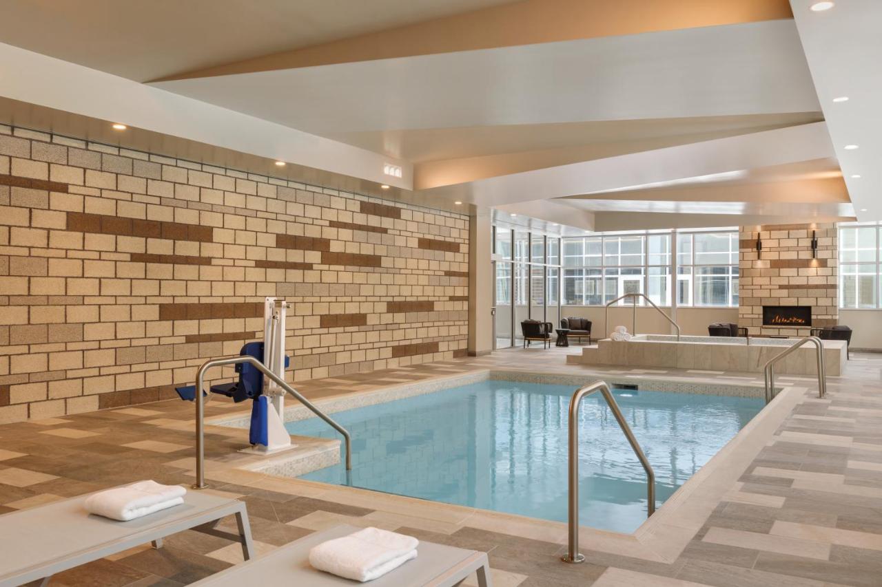 Heated swimming pool: Staybridge Suites Rochester - Mayo Clinic Area, an IHG Hotel