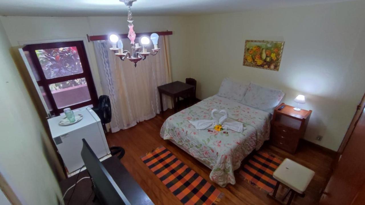 Suites do Reino Penedo RJ — quarto