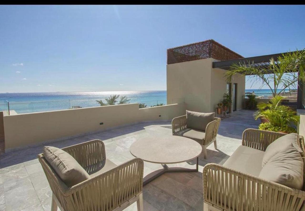 Rooftop swimming pool: Singular - Fifth Avenue Luxury Condo - Playa del Carmen