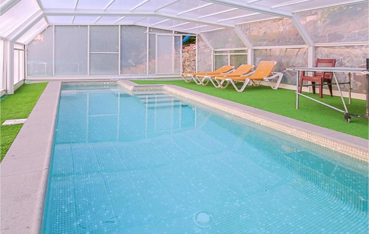 Heated swimming pool: Beautiful home in Santa Susanna with 4 Bedrooms, WiFi and Outdoor swimming pool