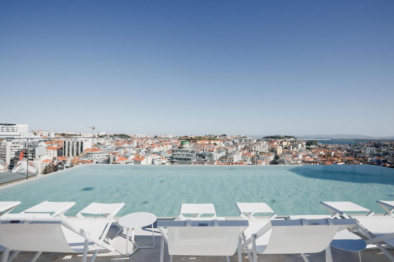 Rooftop swimming pool: EPIC SANA Marquês Hotel