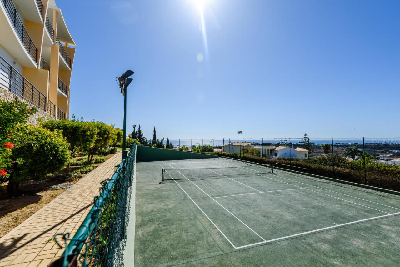 Tennis court: Ocean view Apartment with huge sunny Terrace, 2 Swimming pools & Tennis court