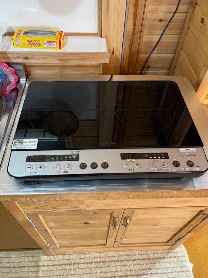 Beach: ログコテージ風の丘