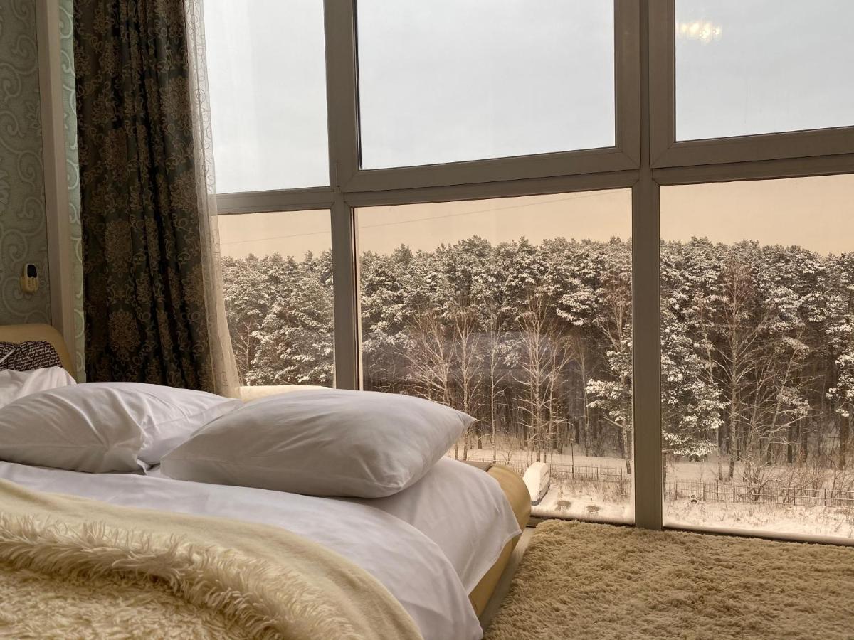 Фото Квартира с панорамным видом на лес,с гидромассажной ванной для двоих