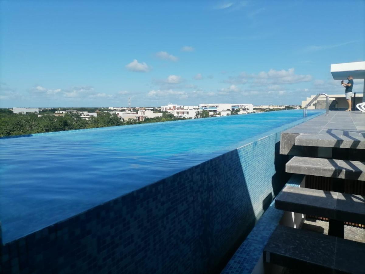 Rooftop swimming pool: Mya, Elle & Elena Residences Tulum
