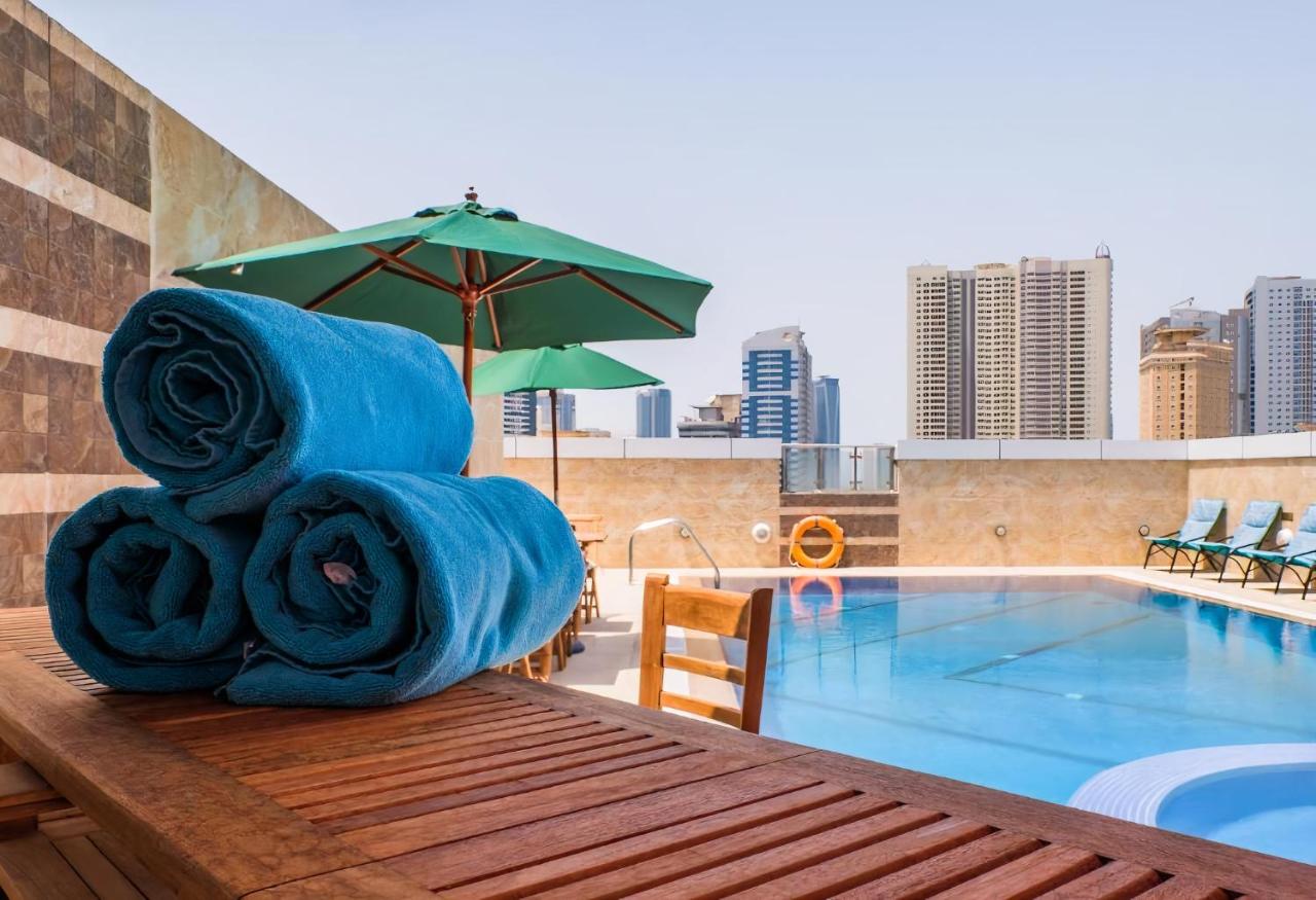 Rooftop swimming pool: Crystal Plaza Al Majaz Hotel