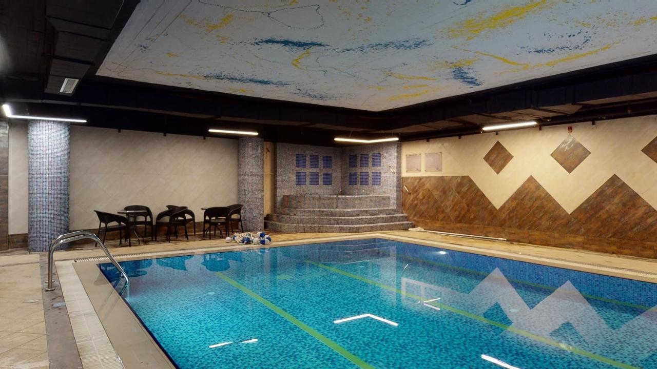 Heated swimming pool: Ayass Hotel