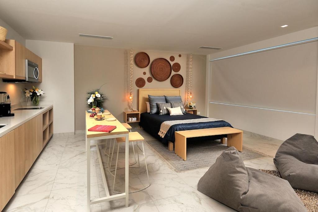 Cozy studio 8 minutes from the beach Rooftoop pool & jacuzzi photo
