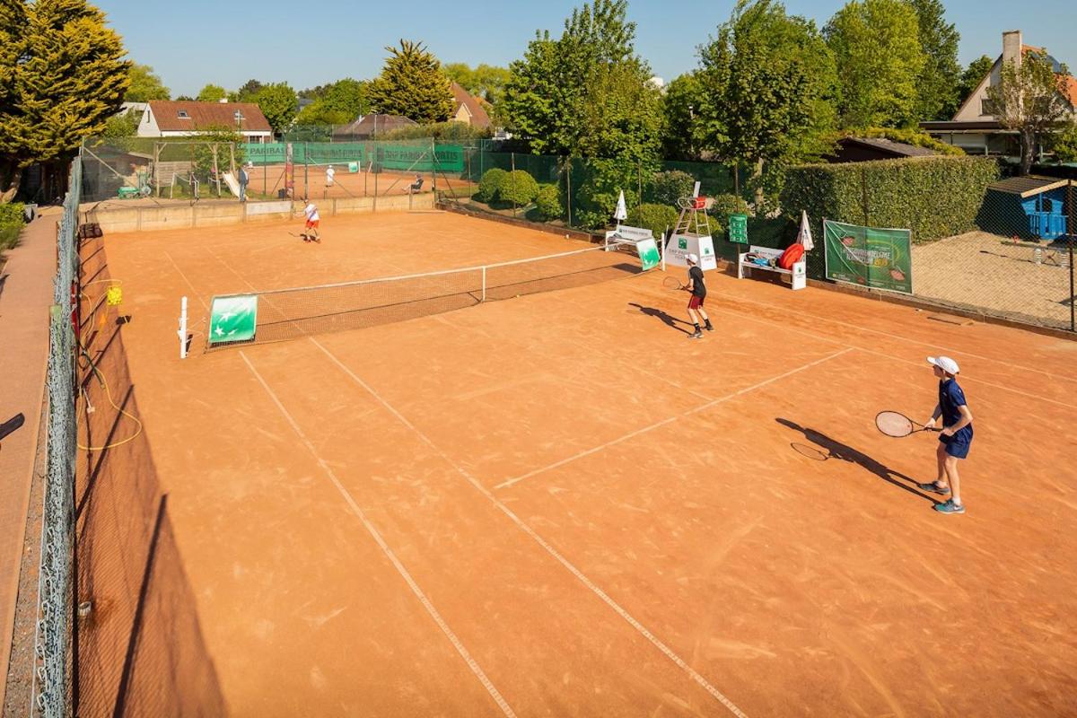 Tennis court: Vakantievilla met luxe en sauna in duinenreservaat