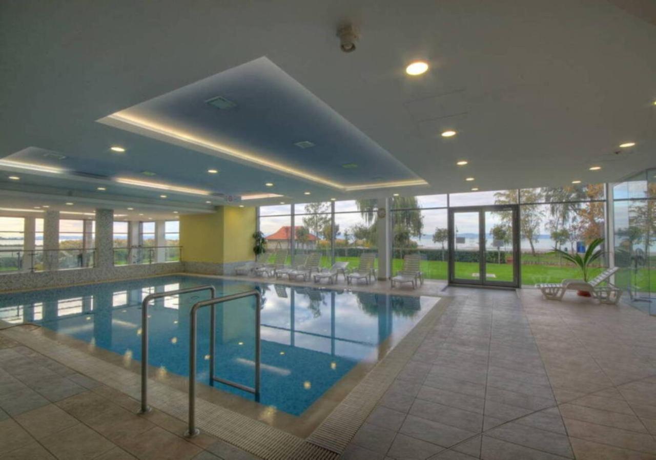Heated swimming pool: MF Club 218 Palazzo Wellness Apartment
