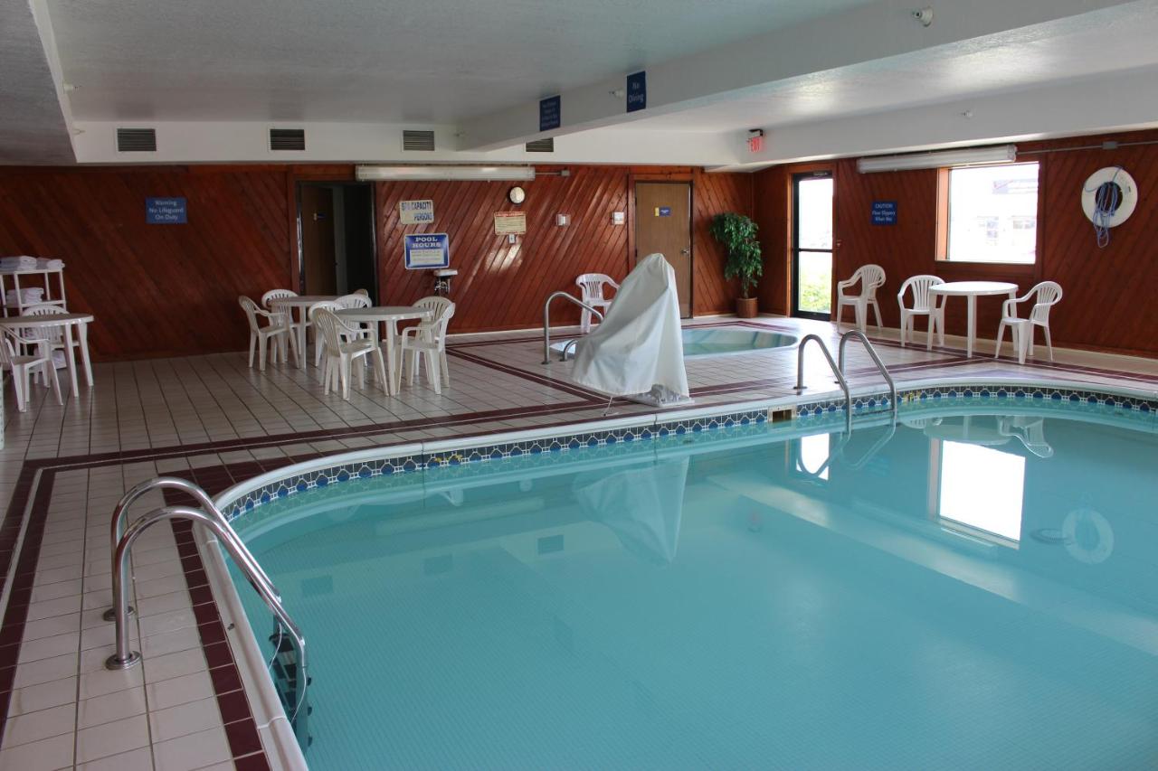 Heated swimming pool: Days Inn by Wyndham Watertown