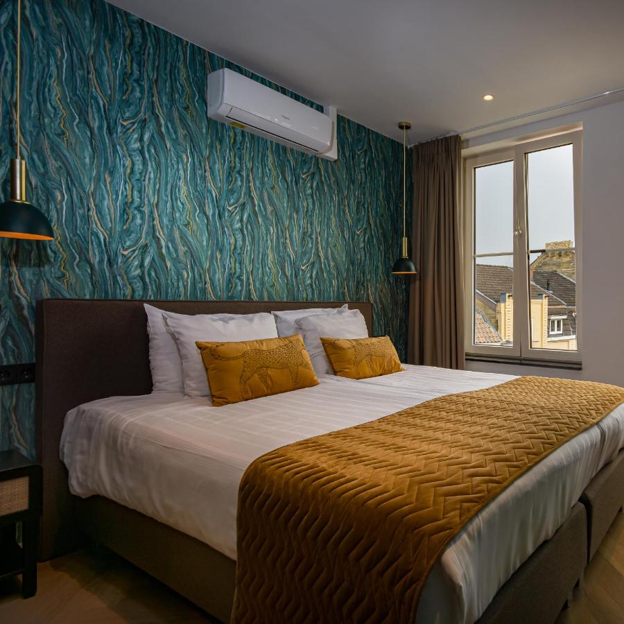 Een bed of bedden in een kamer bij Valkenhof