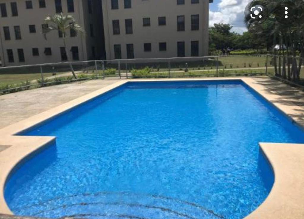 Rooftop swimming pool: Apartamento The Garden