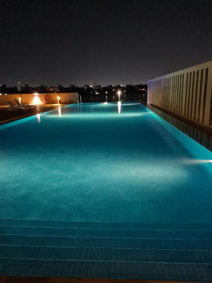Heated swimming pool: LUXURY 2 Bedroom Apartment in GATEWAY Residence