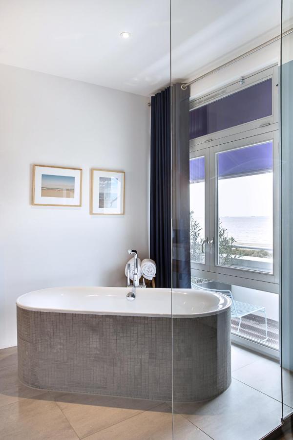 Een badkamer bij Vesper Hotel