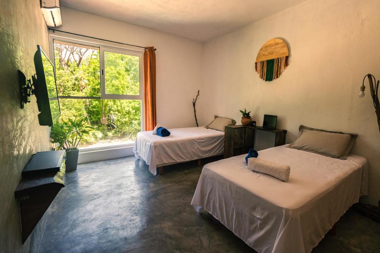 Relaxing comfortable jungle view Eklum Villa Rivera Maya Puerto Morelos POOL AC GYM GATED COMMUNITY photo
