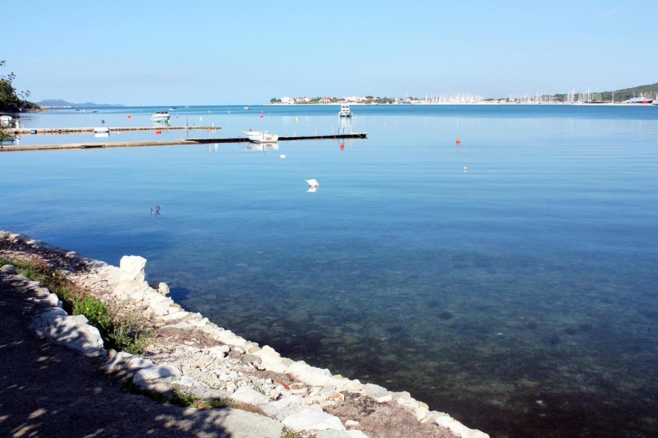 Beach: Apartments by the sea Sukosan, Zadar - 5819