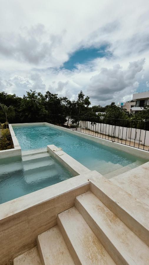Rooftop swimming pool: Condominio en Tulum, la Veleta.
