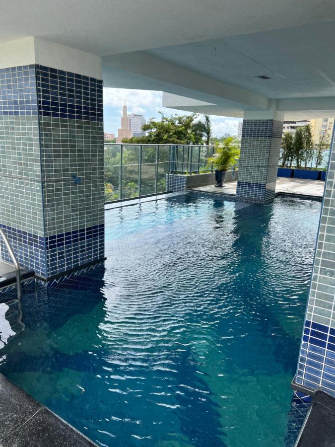 Rooftop swimming pool: Lovely 2 floor condo with pool.