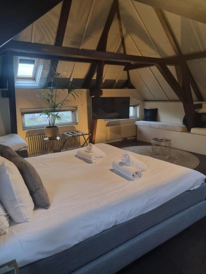 Een bed of bedden in een kamer bij Hotel Oldenburg