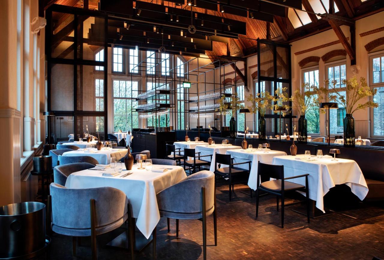 Een restaurant of ander eetgelegenheid bij Pillows Grand Boutique Hotel Maurits at the Park - Small Luxury Hotels