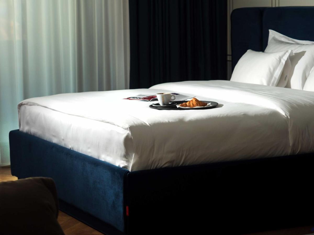 Moncafe Hotel Etico Tirana photo