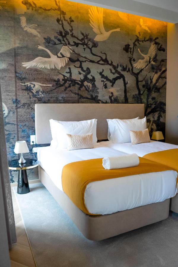 Guest House Jacarandá Faro — quarto