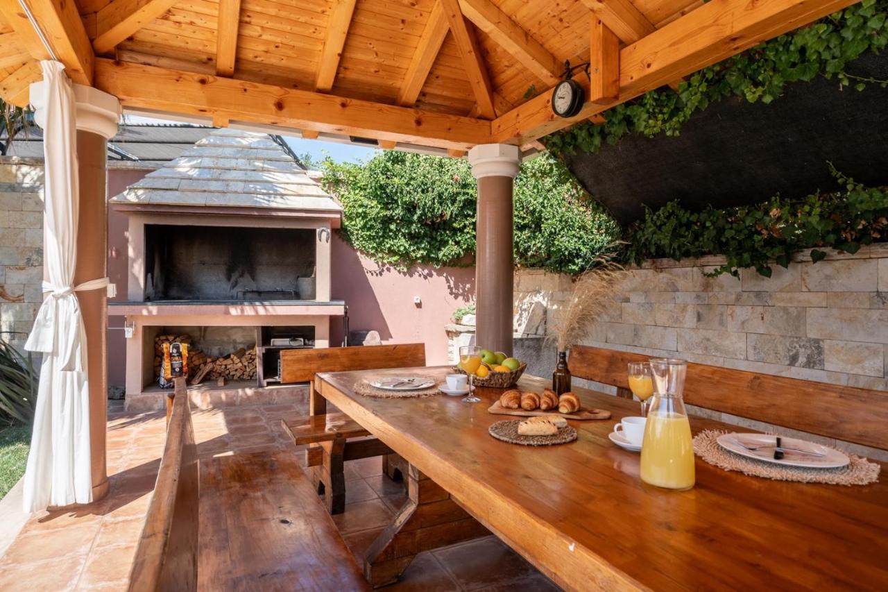 Villa Antura with private heated 50sqm pool, 3 bedrooms, 3 bathrooms, and gym photo