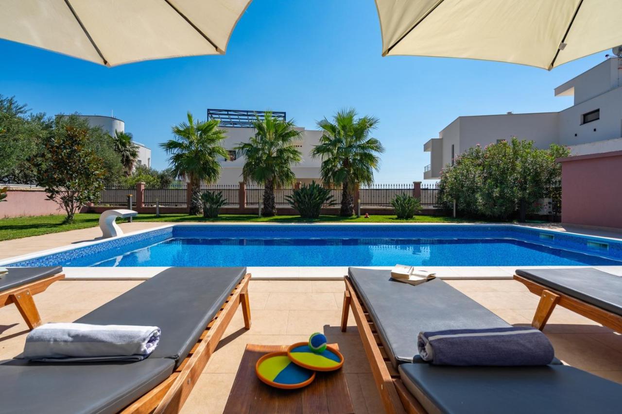 Villa Antura with private heated 50sqm pool, 3 bedrooms, 3 bathrooms, and gym photo