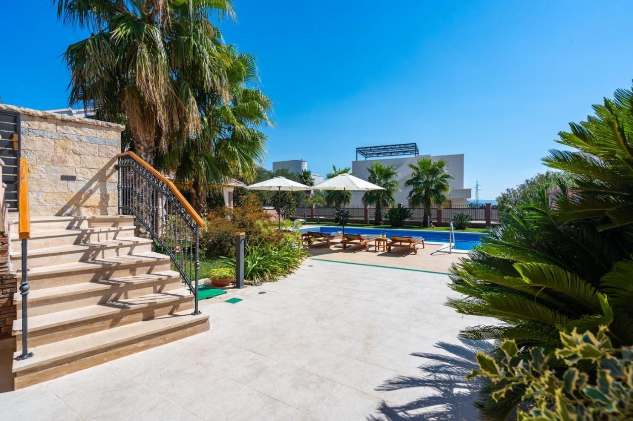 Villa Antura with private heated 50sqm pool, 3 bedrooms, 3 bathrooms, and gym photo