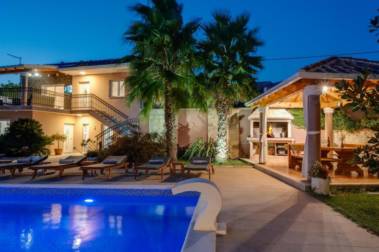 Villa Antura with private heated 50sqm pool, 3 bedrooms, 3 bathrooms, and gym photo