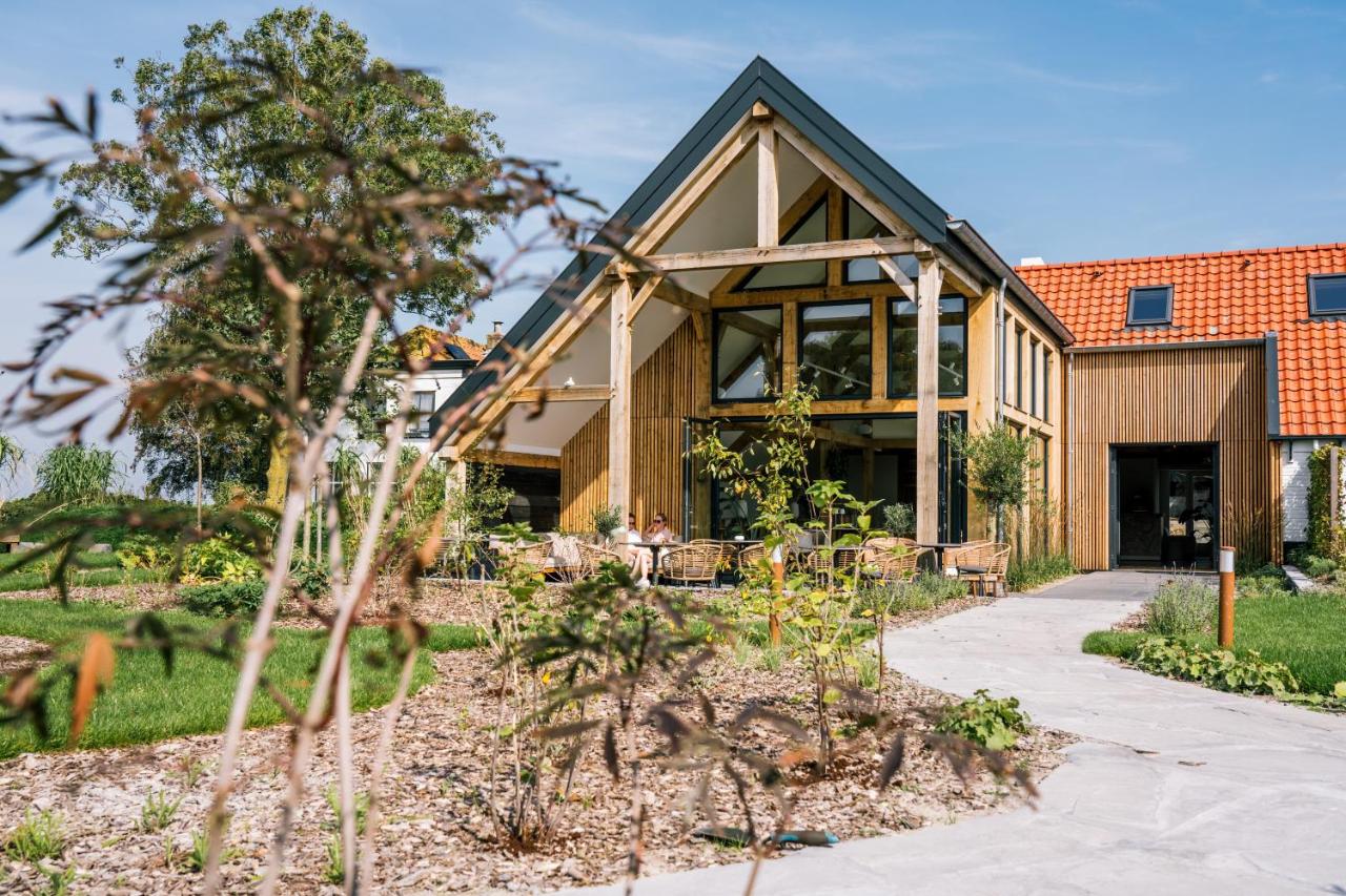 Een tuin van Op Oost Boutique hotel & Restaurant het Kook Atelier