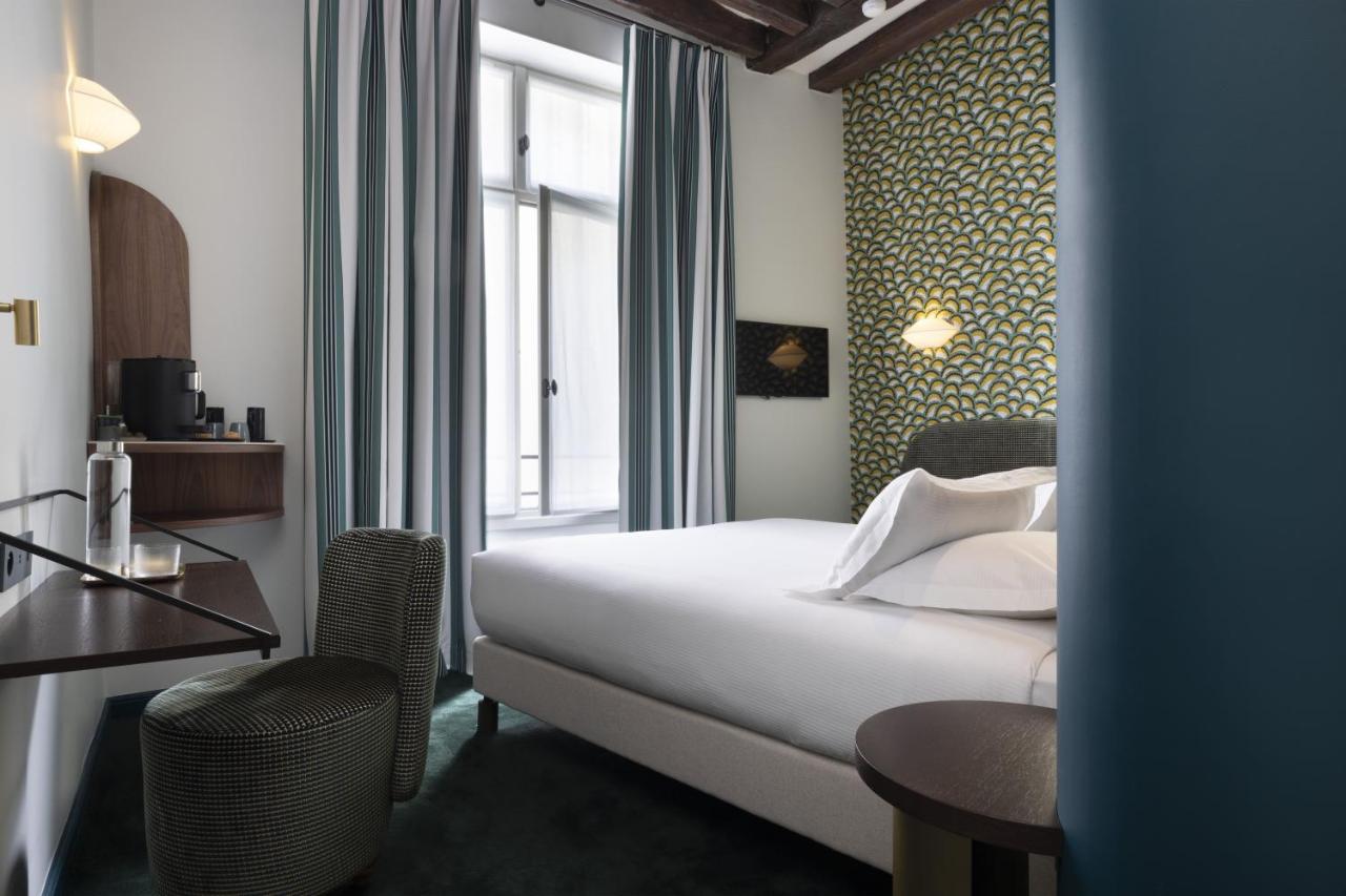 Hotel L de Lutece - Notre-Dame in Paris - Elegancia atemporal en el corazón del Sena.