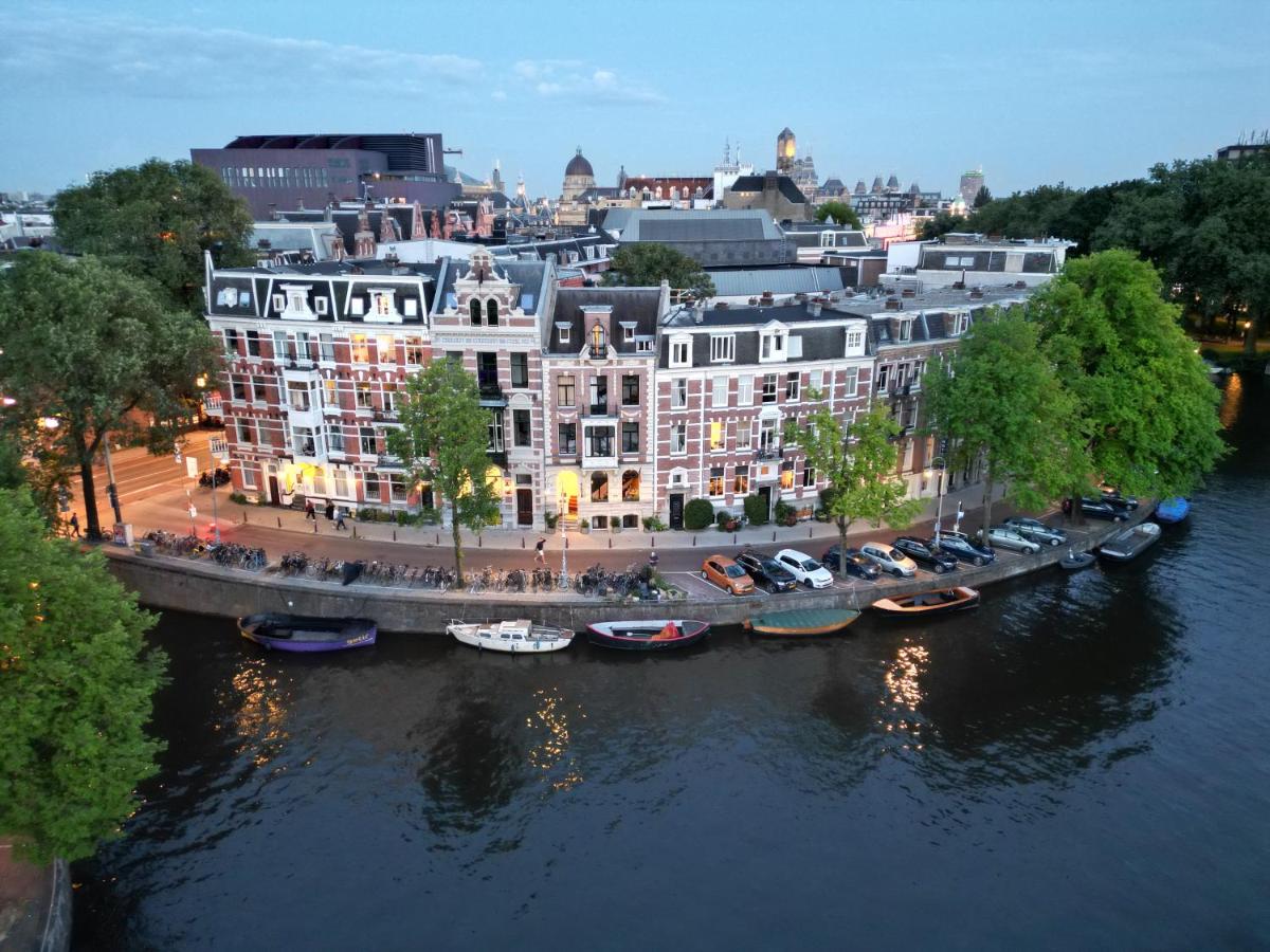 Boutique Hotel View in Amsterdam - Overlook the heart of Amsterdam from your boutique canal-side retreat.
